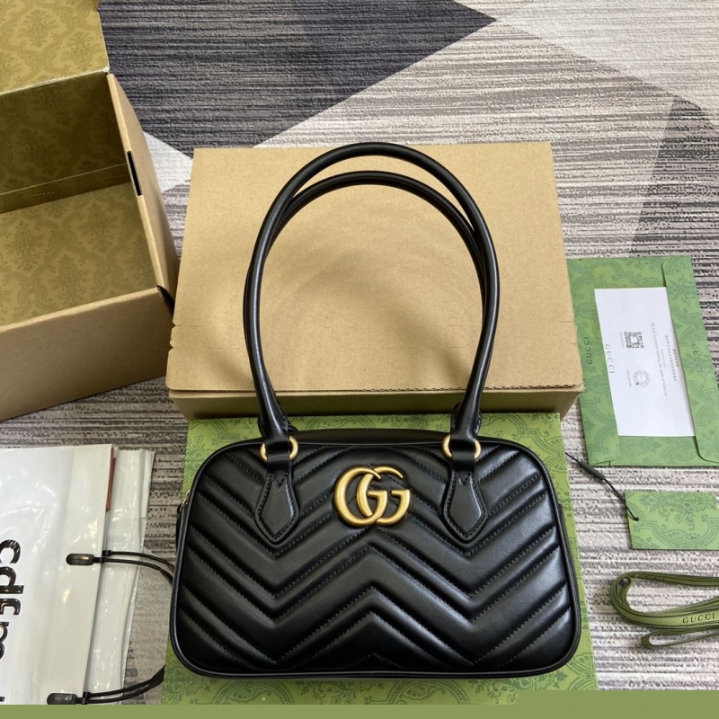 G*u*i top handle bags